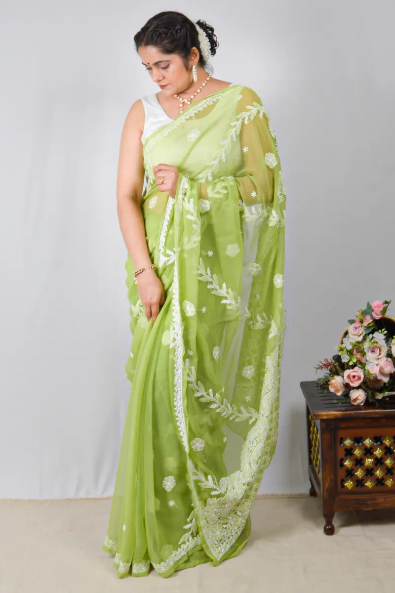 Green georgette saree with Lucknowi Chikankari embroidery and matching blouse – handcrafted ethnic saree by MeMaana.