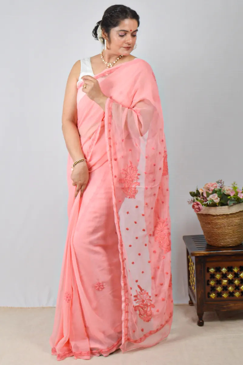 Peach georgette saree with handcrafted Lucknowi Chikankari embroidery and matching blouse – an elegant ethnic wear by MeMaana.