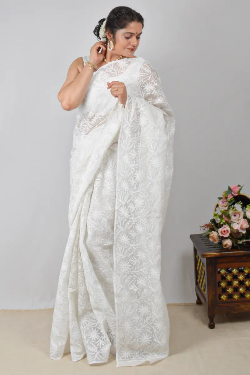 White Kota cotton saree with allover hand-embroidered Lucknowi Chikankari and matching blouse – handcrafted traditional saree by MeMaana.
