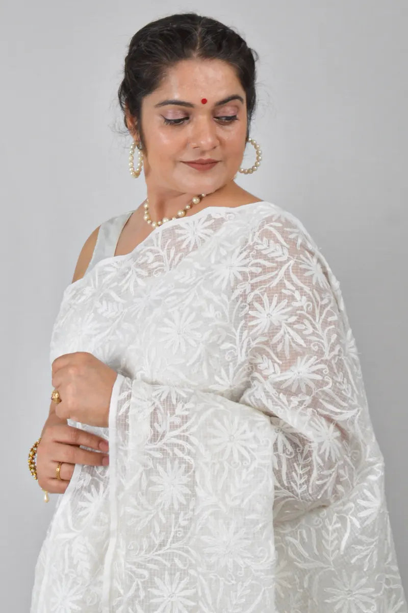 White Kota cotton saree with allover hand-embroidered Lucknowi Chikankari and matching blouse – handcrafted traditional saree by MeMaana.