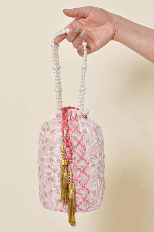 Fabnuma Handcrafted Pink Chikankari Potli Bag with intricate embroidery and pearl handle in Kota cotton fabric.