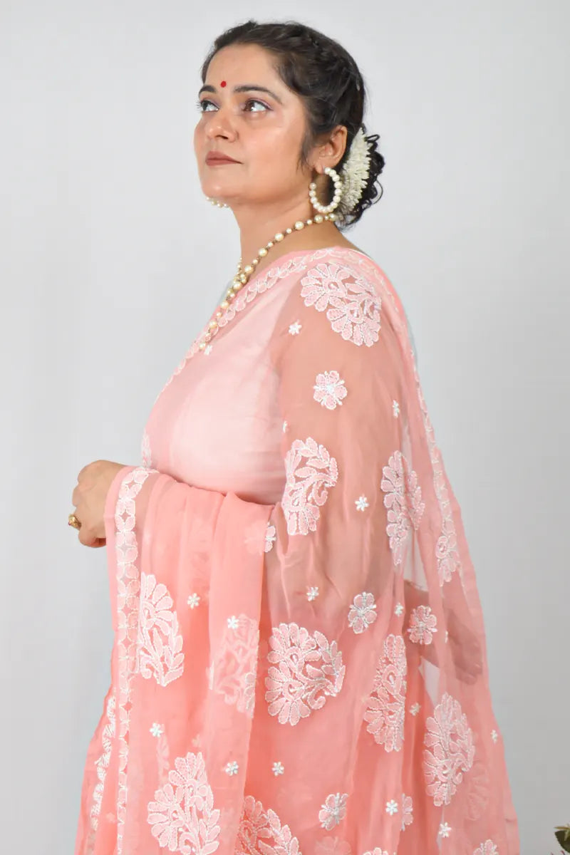 Peach georgette saree with handcrafted Lucknowi Chikankari embroidery and matching blouse – traditional elegance by MeMaana.