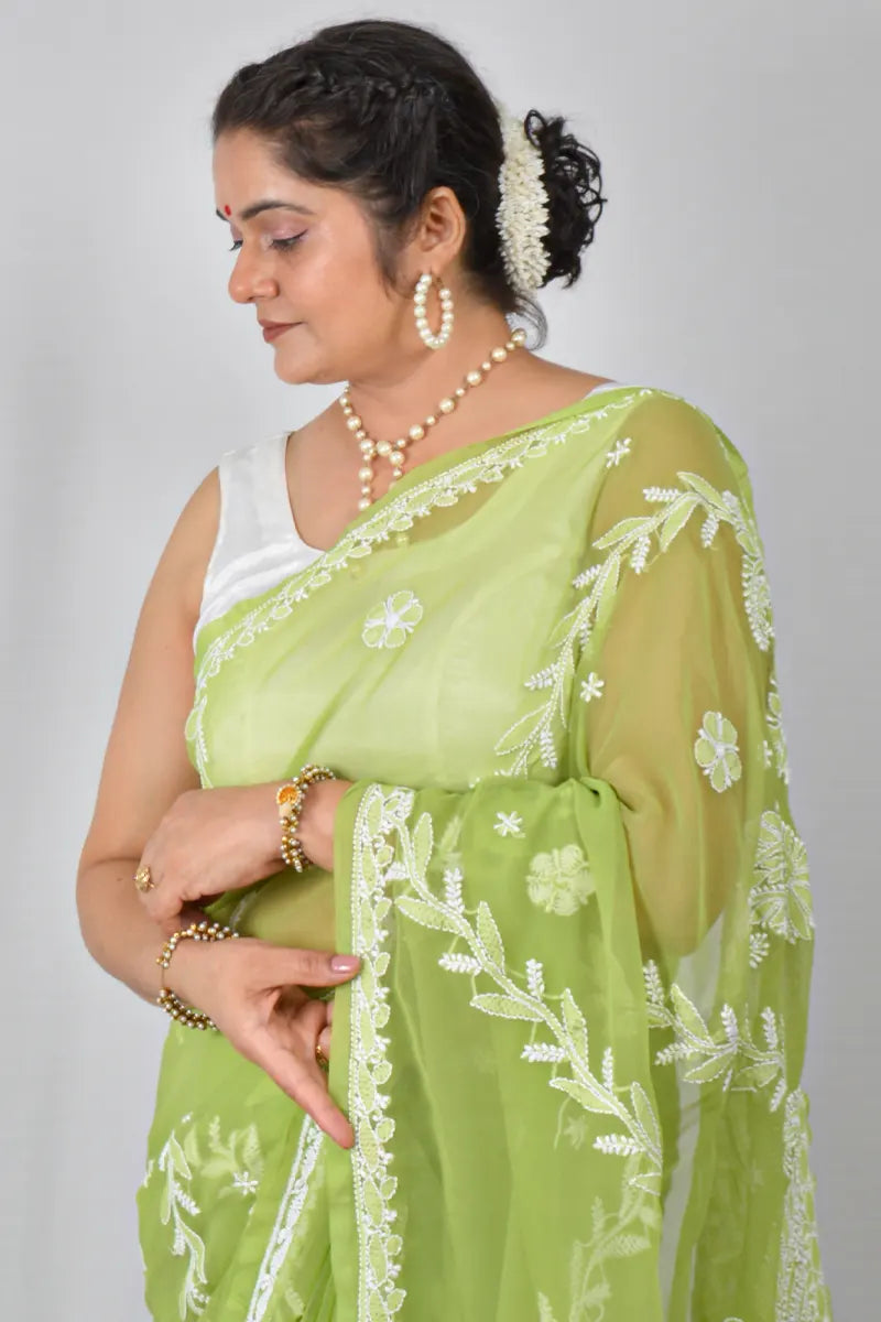 Green georgette saree with Lucknowi Chikankari embroidery and matching blouse – handcrafted ethnic saree by MeMaana.