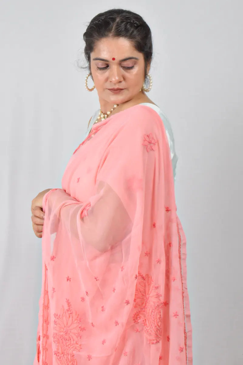 Peach georgette saree with handcrafted Lucknowi Chikankari embroidery and matching blouse – an elegant ethnic wear by MeMaana.