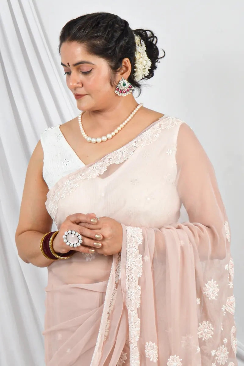 Handcrafted Beige Georgette Saree with Pearl & Sequin Work Designer Lucknowi Chikankari Embroidery and a matching Blouse, ideal for Festive and occasions.