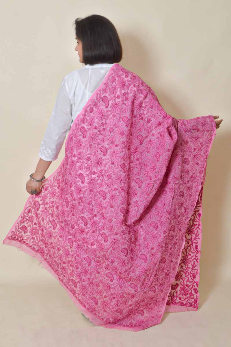 Fabnuma Handcrafted Pink Cotton Allover Chikankari Dupatta draped on model showcasing intricate embroidery and vibrant pink fabric.