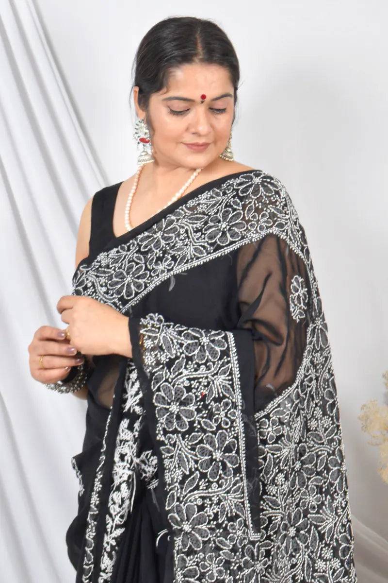 Black Georgette saree with Lucknowi Chikankari embroidery and unstitched blouse – handcrafted festive wear by Fabnuma
