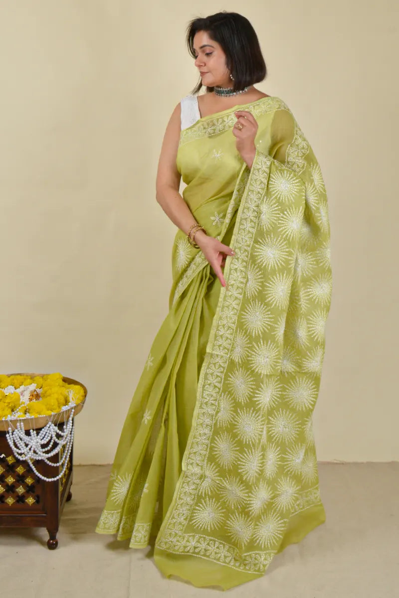 Handcrafted Green Kota Cotton Saree with intricate Lucknowi Chikankari embroidery and a matching blouse, ideal for festive and wedding occasions.