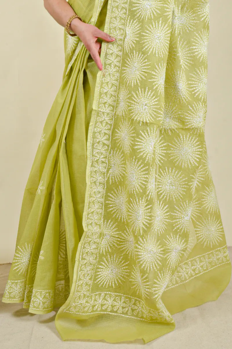 Handcrafted Green Kota Cotton Saree with intricate Lucknowi Chikankari embroidery and a matching blouse, ideal for festive and wedding occasions.