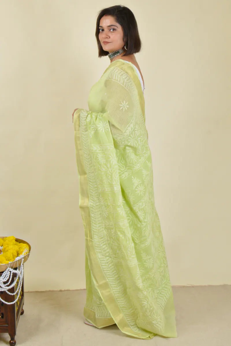 Hand-embroidered green Kota Cotton chikankari saree with blouse by Fabnuma