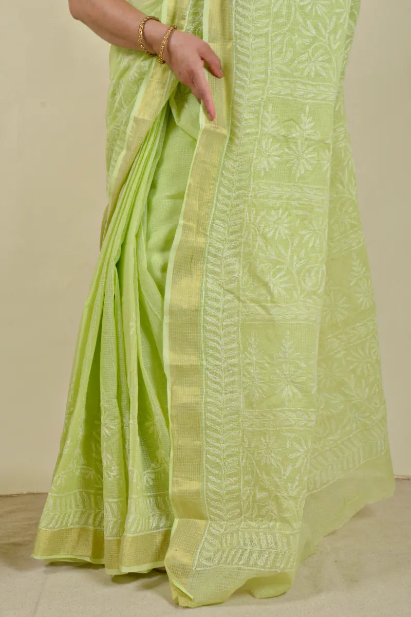 Hand-embroidered green Kota Cotton chikankari saree with blouse by Fabnuma
