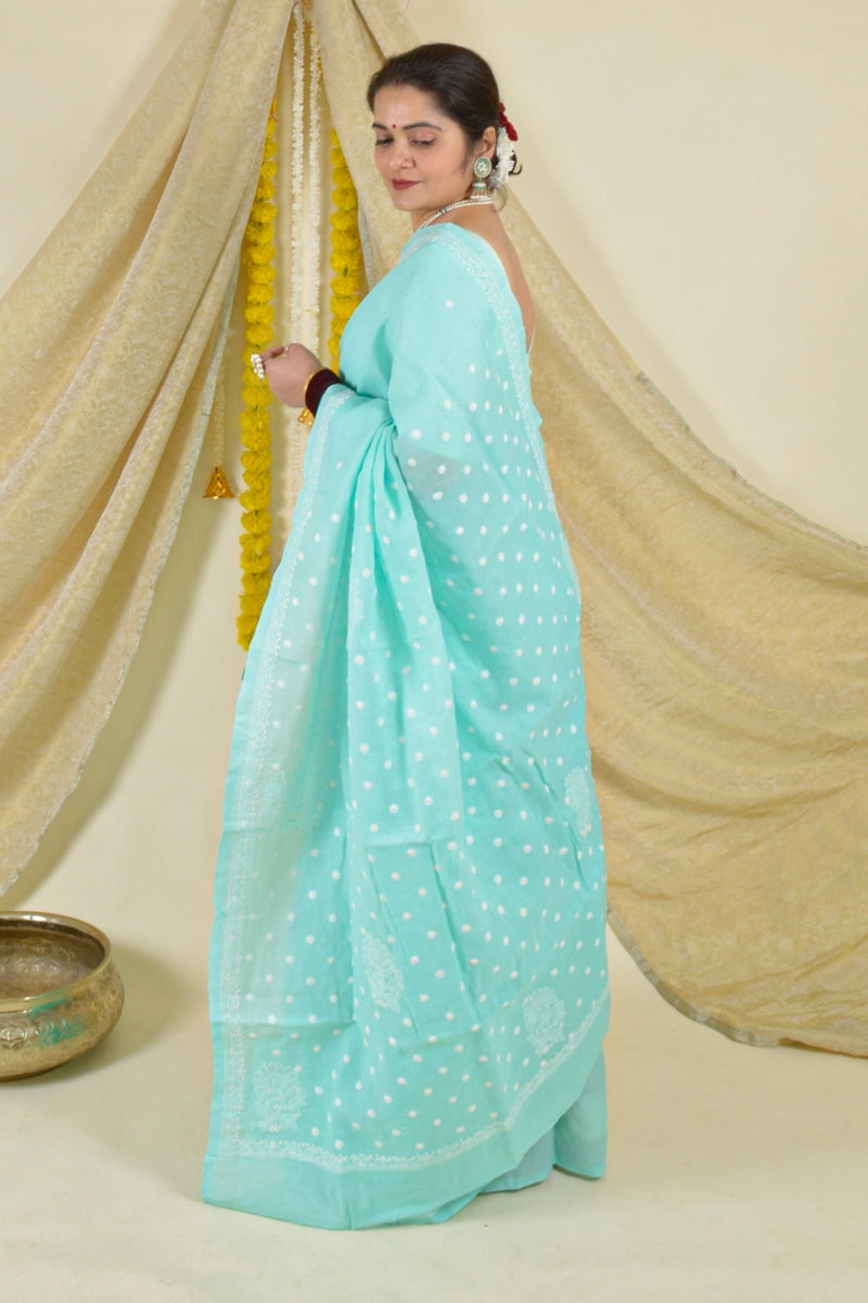 Handcrafted Sea Green Cotton Saree with intricate Lucknowi Chikankari embroidery and a matching blouse, ideal for festive and wedding occasions.