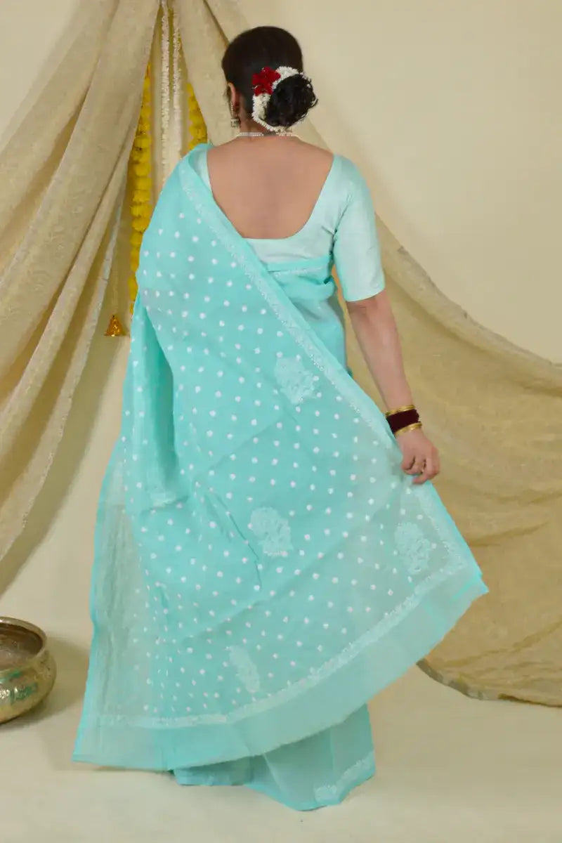 Handcrafted Sea Green Cotton Saree with intricate Lucknowi Chikankari embroidery and a matching blouse, ideal for festive and wedding occasions.