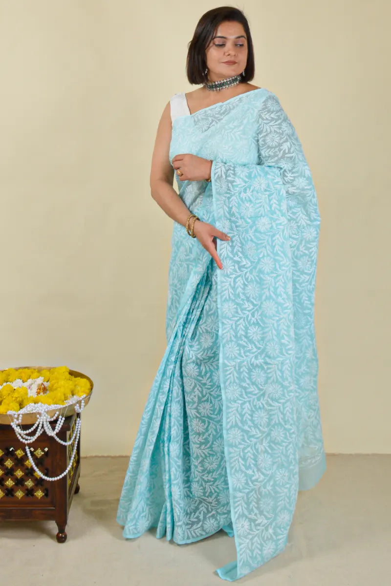 Handcrafted Kota Cotton Saree with intricate Lucknowi Chikankari embroidery and a matching blouse, ideal for festive and wedding occasions.