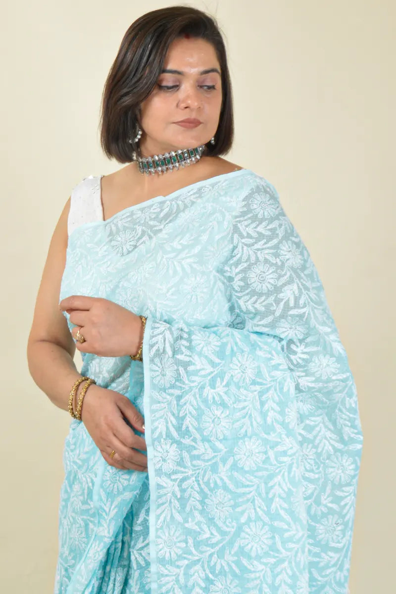 Handcrafted Kota Cotton Saree with intricate Lucknowi Chikankari embroidery and a matching blouse, ideal for festive and wedding occasions.