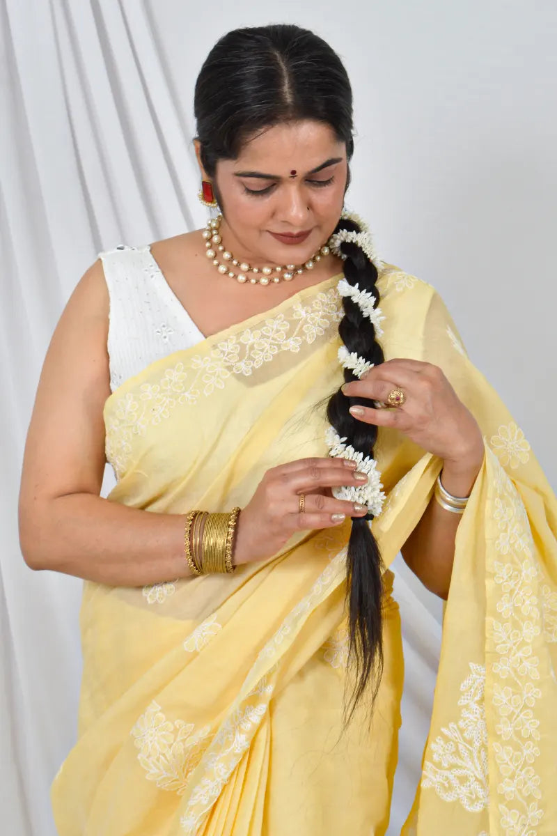 Handcrafted Yellow cotton Saree with intricate Lucknowi Chikankari embroidery and a matching Blouse, ideal for Festive and  occasions.