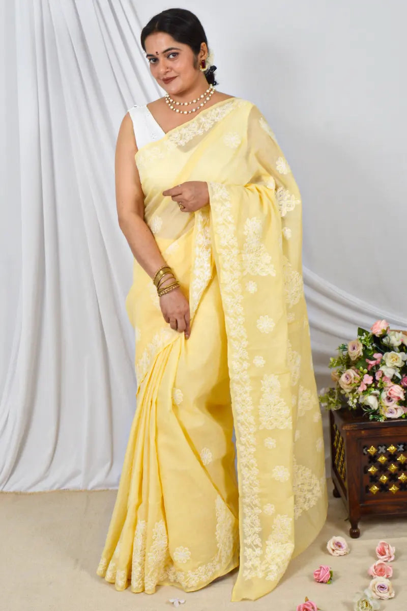 Handcrafted Yellow cotton Saree with intricate Lucknowi Chikankari embroidery and a matching Blouse, ideal for Festive and  occasions.