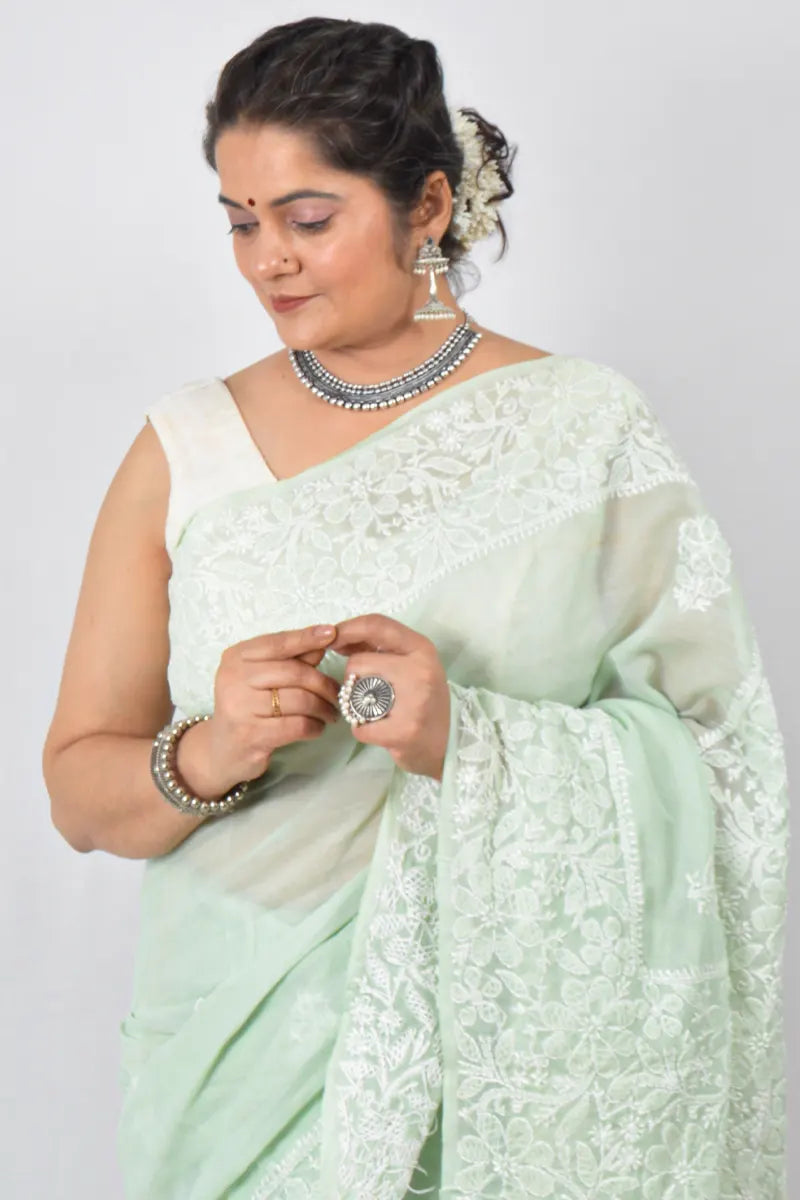 Green Cotton saree with Lucknowi Chikankari embroidery and unstitched blouse – handcrafted festive wear by Fabnuma