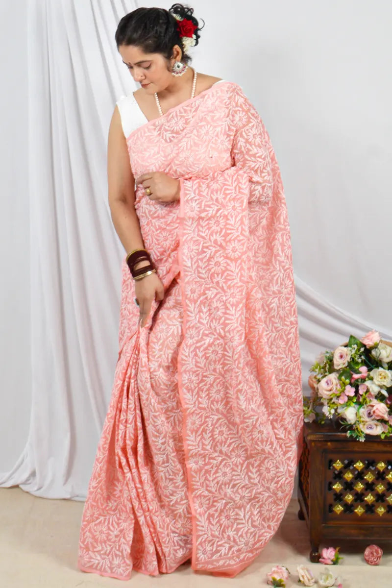 Handcrafted Peach Kota Cotton Allover Tepchi Work Saree with intricate Lucknowi Chikankari embroidery and ideal for Festive and  occasions.