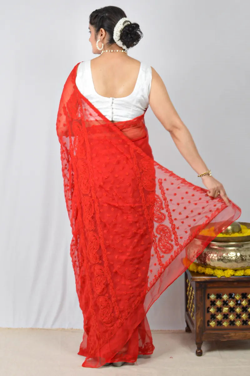 Red georgette saree with hand-embroidered Lucknowi Chikankari and unstitched blouse – festive and elegant ethnic wear by MeMaana.