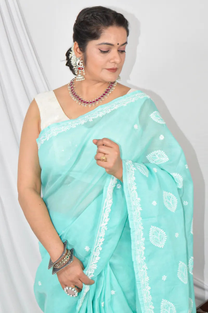 Handcrafted Sea Green Designer Cotton saree with intricate Lucknowi Chikankari embroidery and a matching blouse, ideal for festive and wedding .