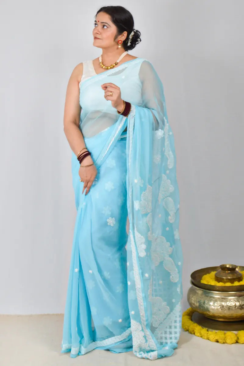 Sky blue Georgette saree with hand-embroidered Lucknowi Chikankari and matching blouse – MeMaana handcrafted ethnic wear.