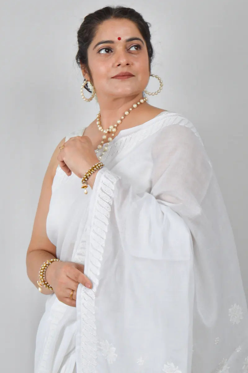 White cotton saree with hand-embroidered Lucknowi Chikankari and matching blouse – handcrafted summer-friendly ethnic wear by MeMaana.