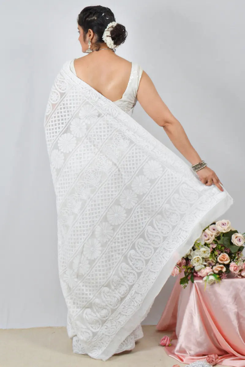 White pure georgette saree with allover hand-embroidered Lucknowi Chikankari and matching blouse – handcrafted ethnic saree by Fabnuma