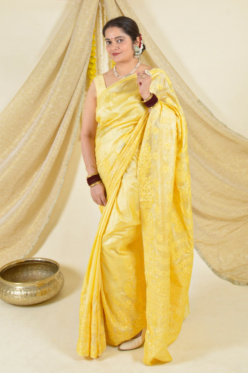 Handcrafted yellow tussar silk chikankari saree with blouse by Fabnuma