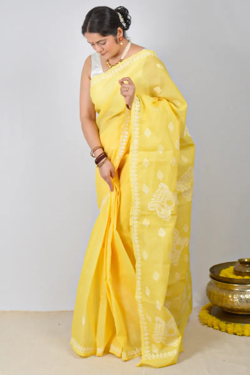 Yellow cotton saree with hand-embroidered Lucknowi Chikankari and matching blouse – MeMaana handcrafted ethnic wear.