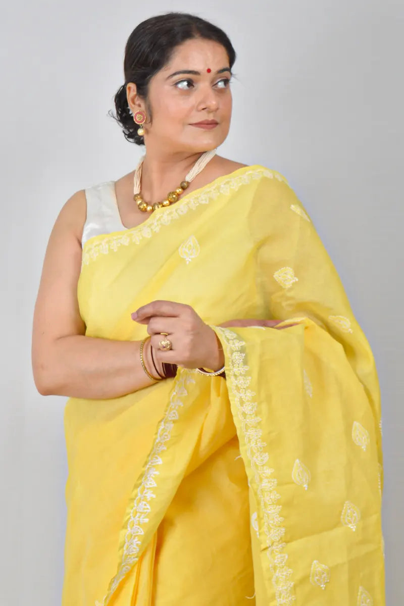 Yellow cotton saree with hand-embroidered Lucknowi Chikankari and matching blouse – MeMaana handcrafted ethnic wear.