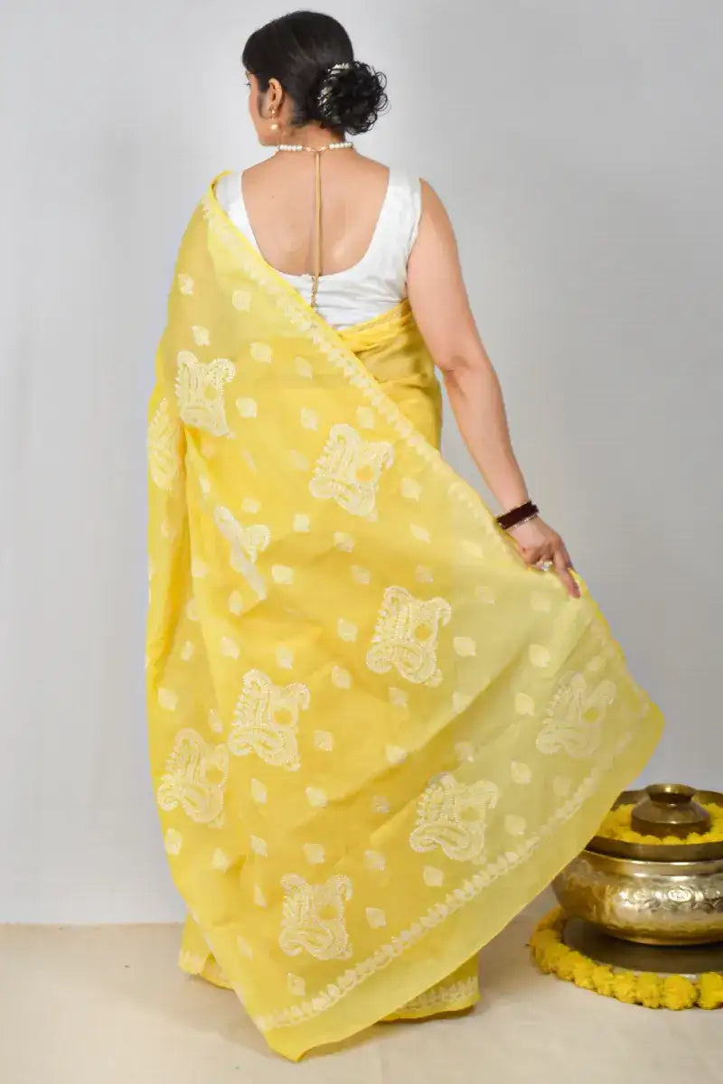 Yellow cotton saree with hand-embroidered Lucknowi Chikankari and matching blouse – MeMaana handcrafted ethnic wear.