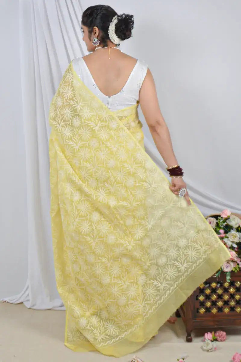 Handcrafted Yellow Allover Kota Cotton saree with intricate Lucknowi Chikankari embroidery and a matching blouse, ideal for festive and wedding .