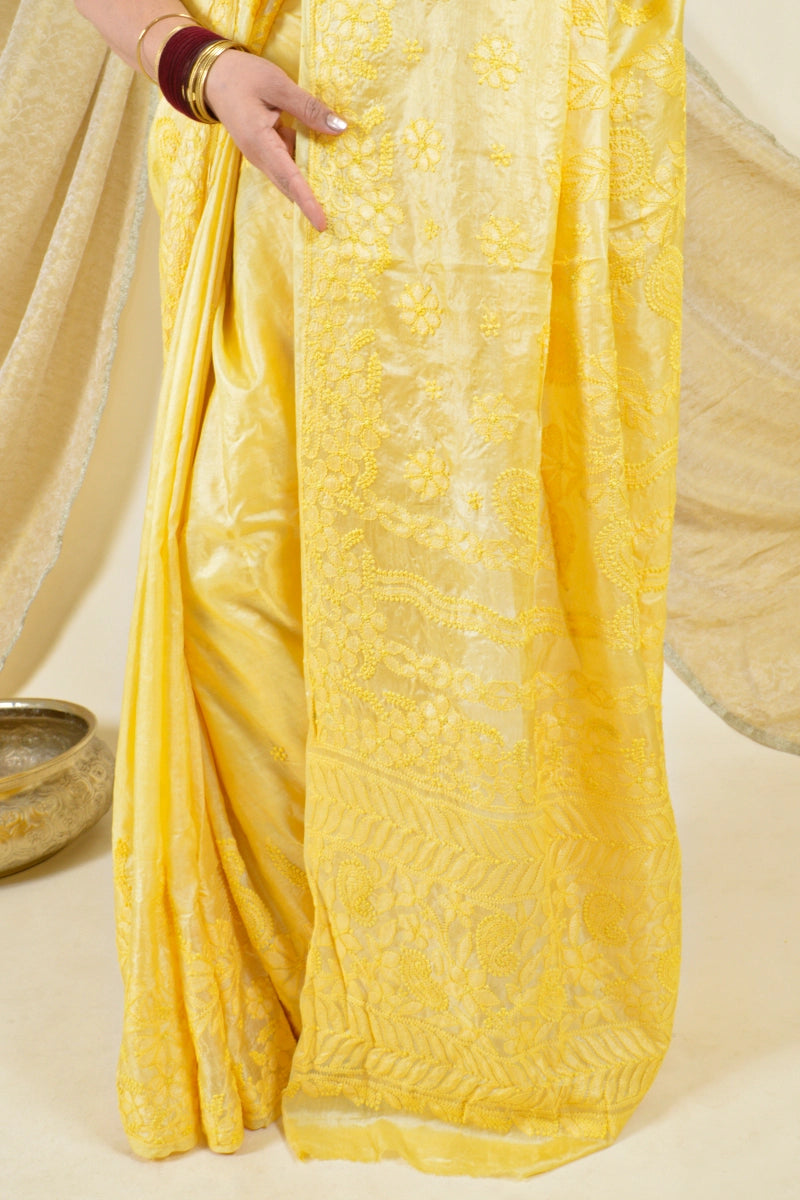 Handcrafted yellow tussar silk chikankari saree with blouse by Fabnuma