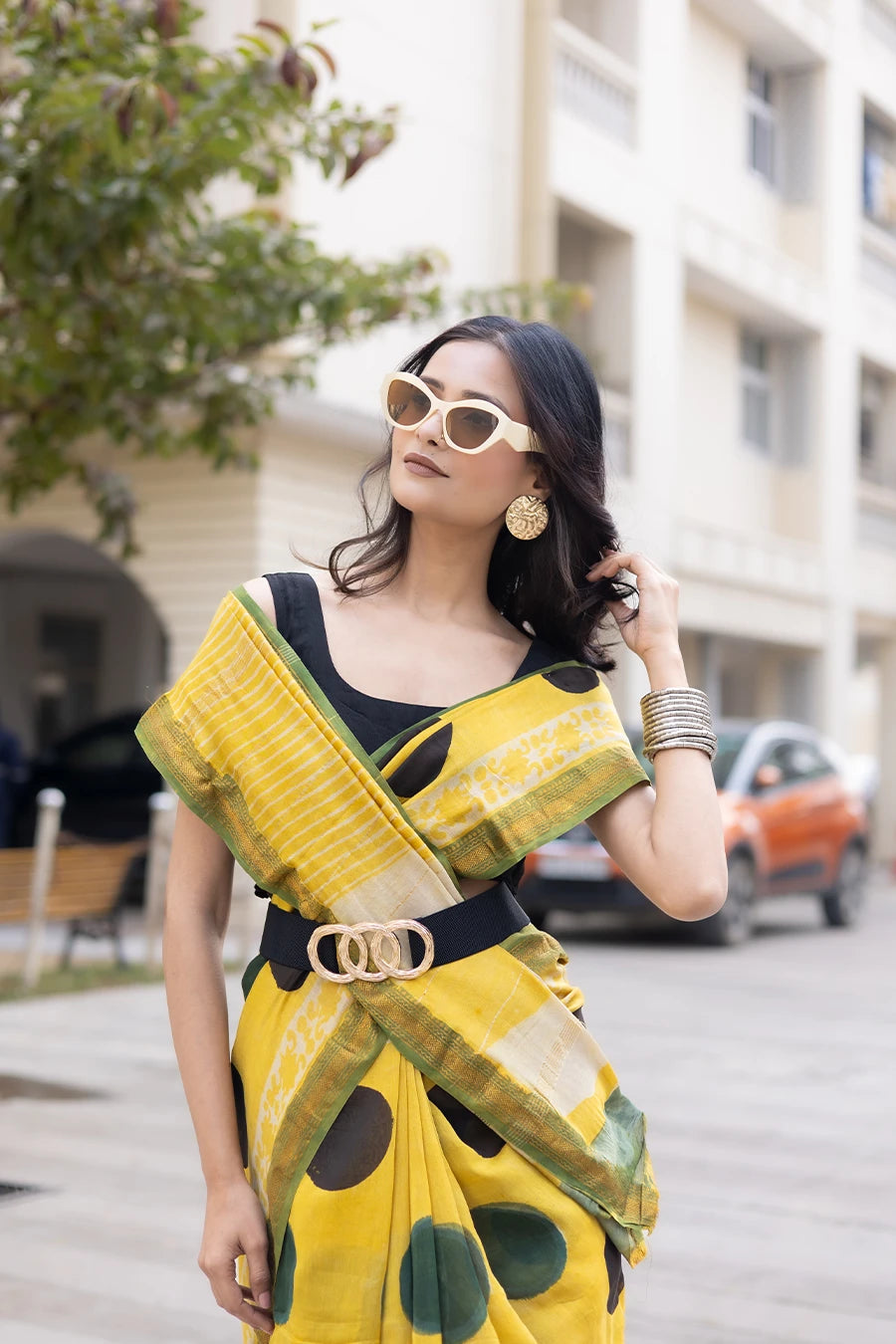Lightweight yellow Maheshwari silk saree with polka dots and matching blouse