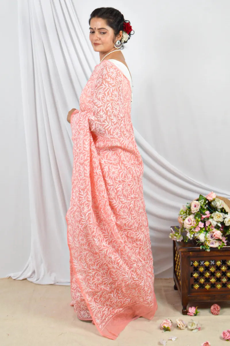 Handcrafted Peach Kota Cotton Allover Tepchi Work Saree with intricate Lucknowi Chikankari embroidery and a matching Blouse, ideal for Festive and  occasions.
