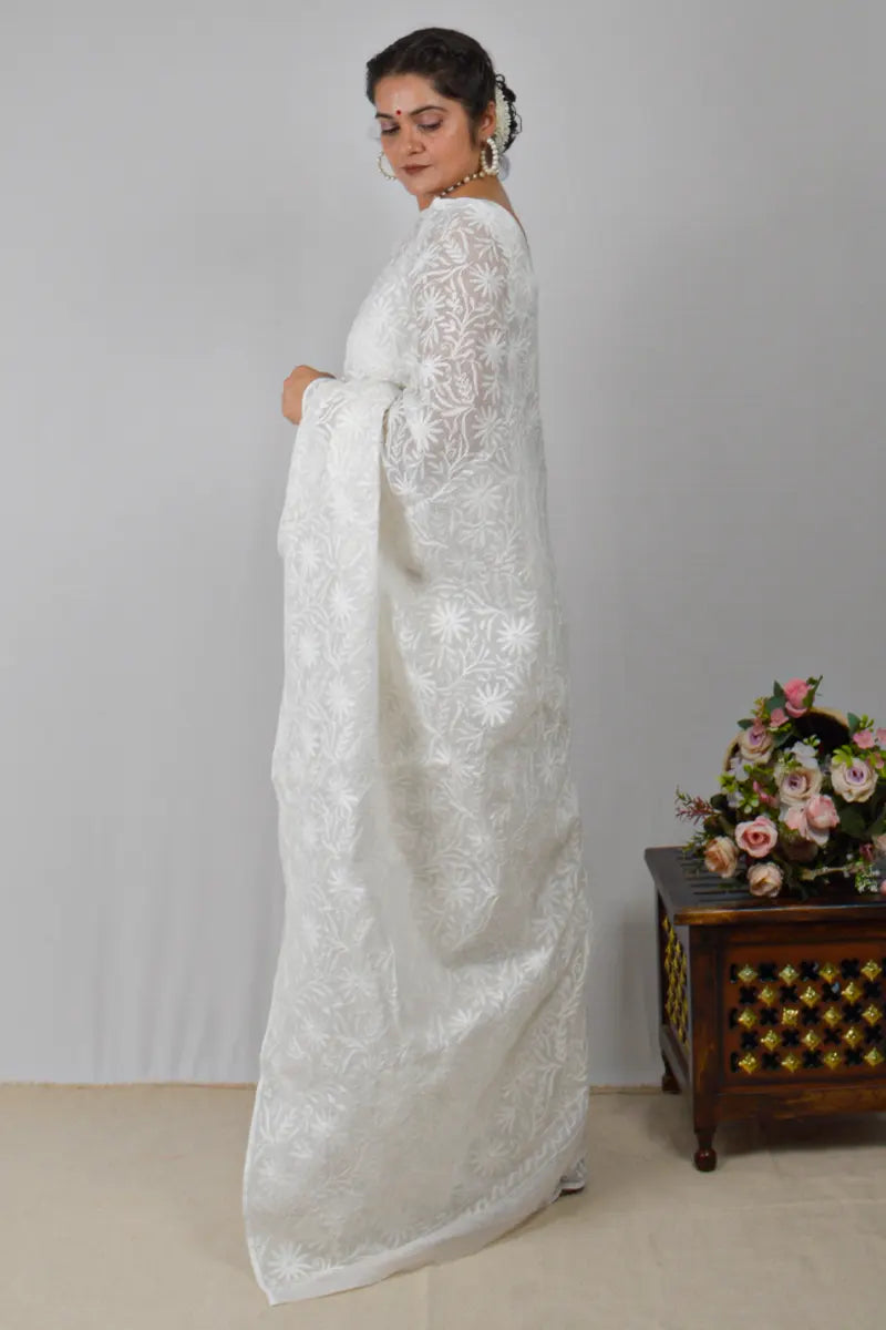 White Kota cotton saree with allover hand-embroidered Lucknowi Chikankari and matching blouse – handcrafted traditional saree by MeMaana.