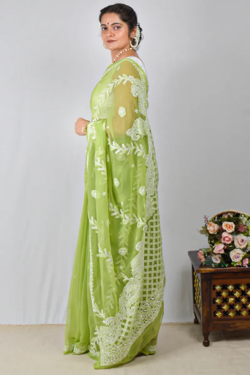 Green georgette saree with Lucknowi Chikankari embroidery and matching blouse – handcrafted ethnic saree by MeMaana.