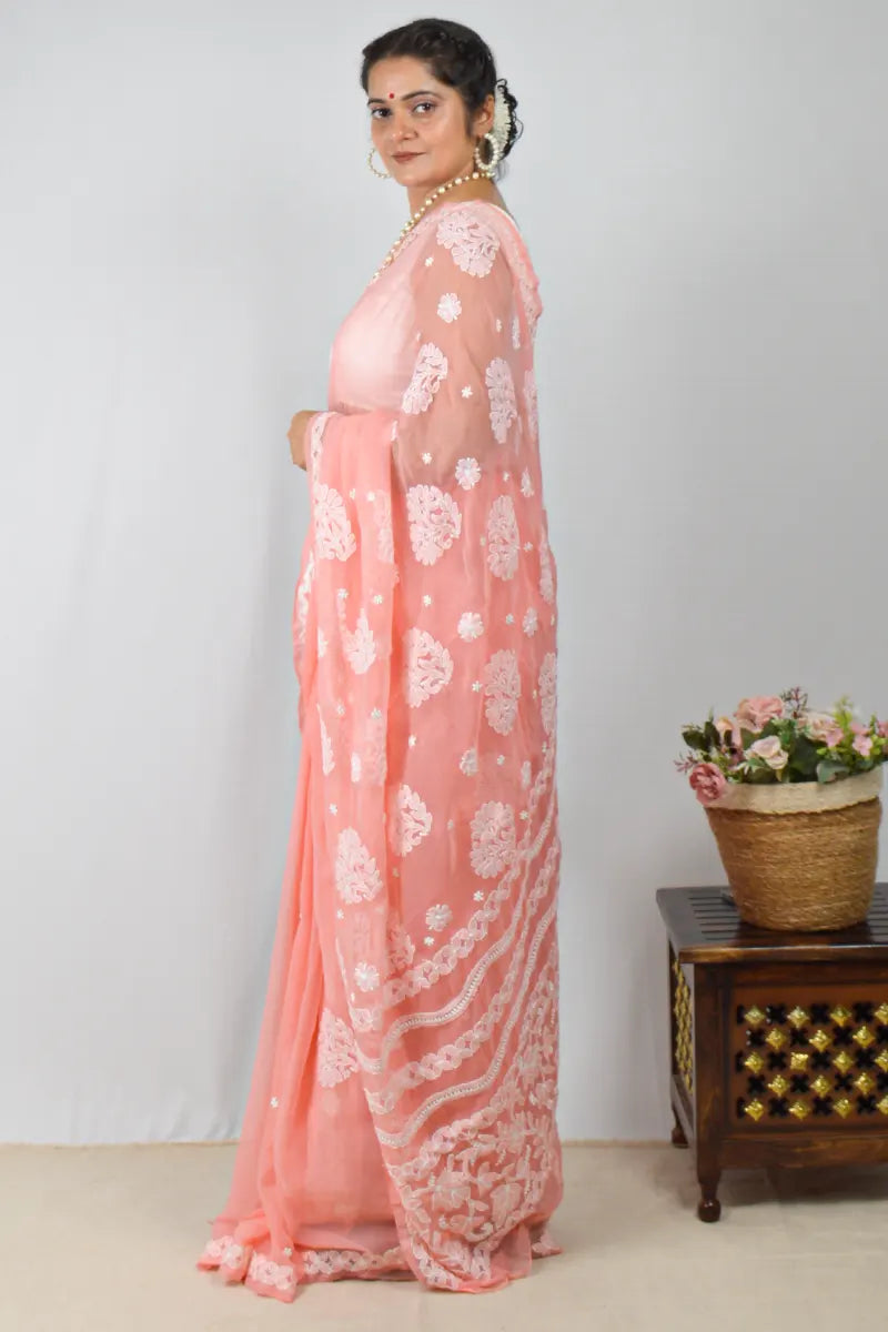 Peach georgette saree with handcrafted Lucknowi Chikankari embroidery and matching blouse – traditional elegance by MeMaana.