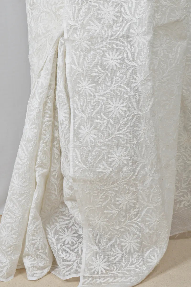 White Kota cotton saree with allover hand-embroidered Lucknowi Chikankari and matching blouse – handcrafted traditional saree by MeMaana.