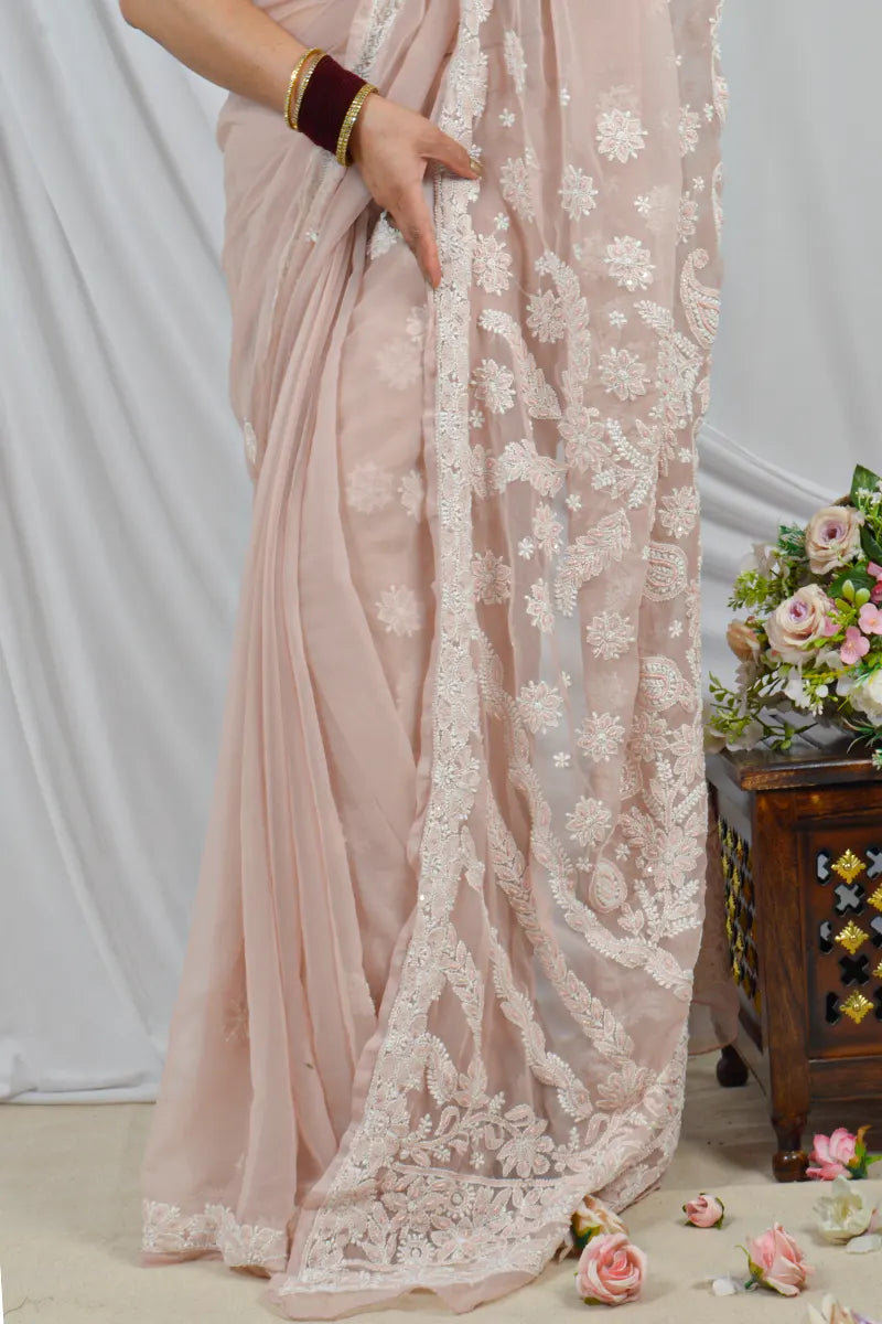 Handcrafted Beige Georgette Saree with Pearl & Sequin Work Designer Lucknowi Chikankari Embroidery and a matching Blouse, ideal for Festive and  occasions.