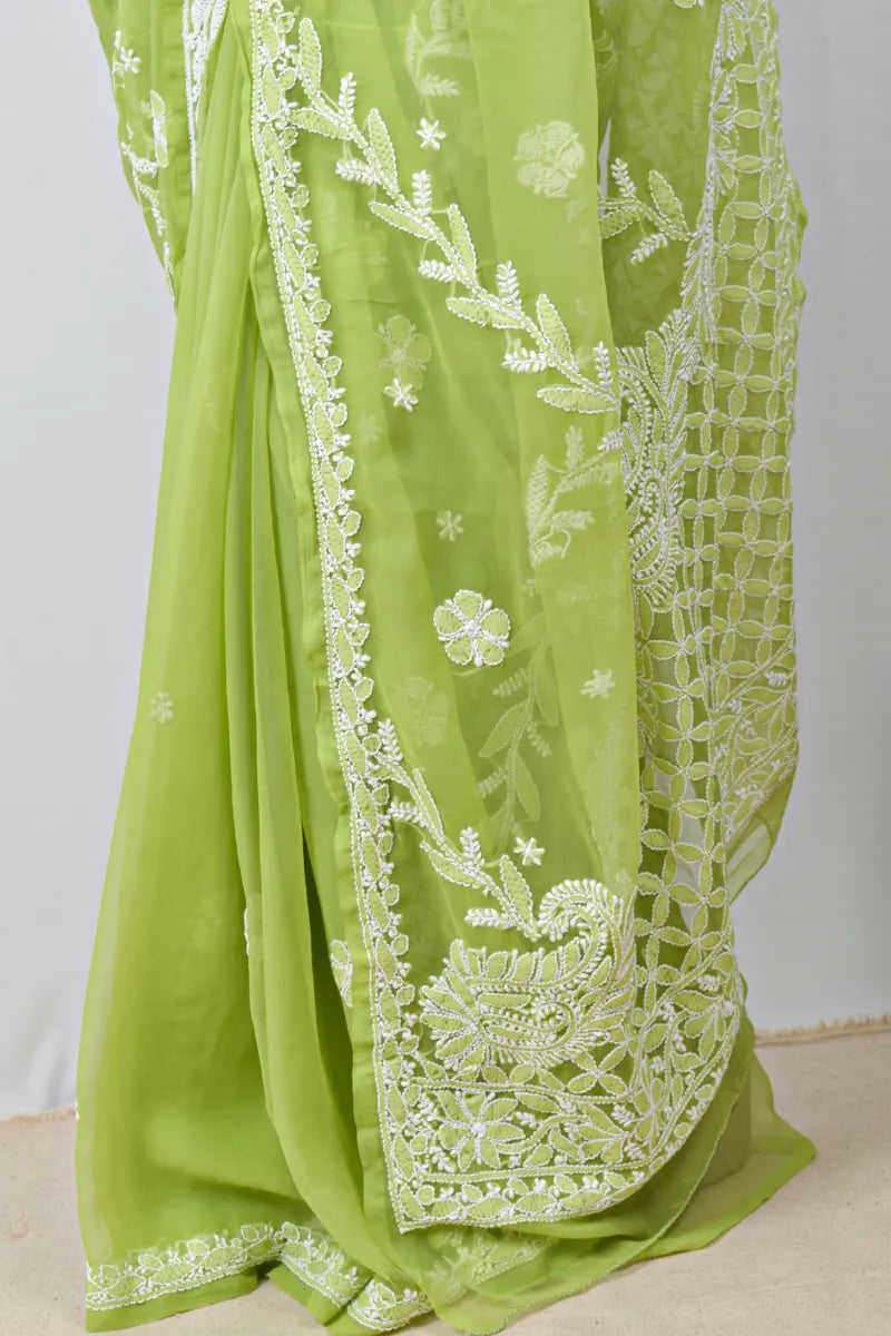 Green georgette saree with Lucknowi Chikankari embroidery and matching blouse – handcrafted ethnic saree by MeMaana.