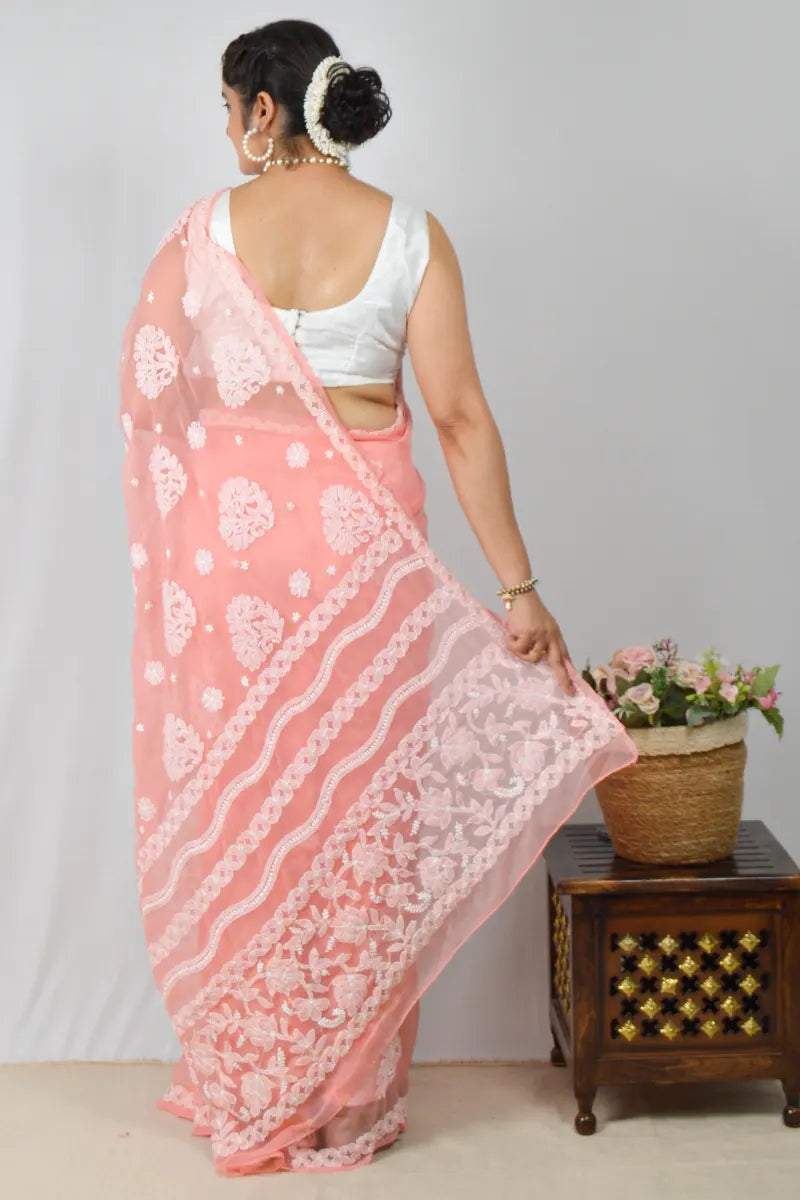 Peach georgette saree with handcrafted Lucknowi Chikankari embroidery and matching blouse – traditional elegance by MeMaana.