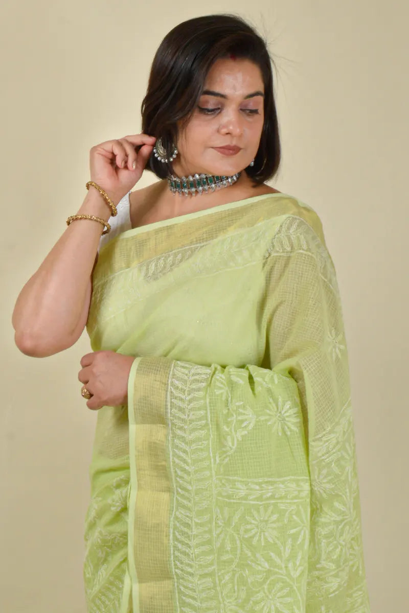 Hand-embroidered green Kota Cotton chikankari saree with blouse by Fabnuma