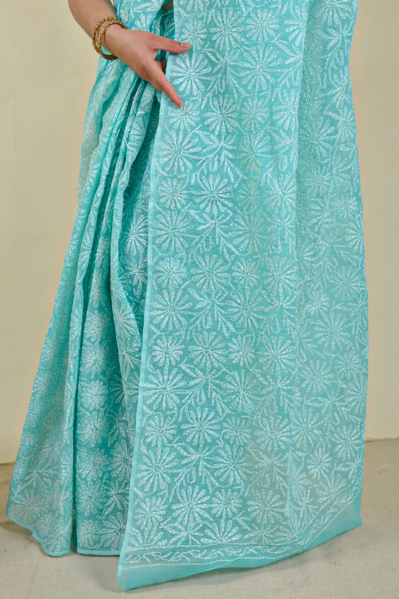 Handcrafted Sea green Kota Cotton saree with intricate Lucknowi Chikankari embroidery and a matching blouse, ideal for festive and wedding occasions.
