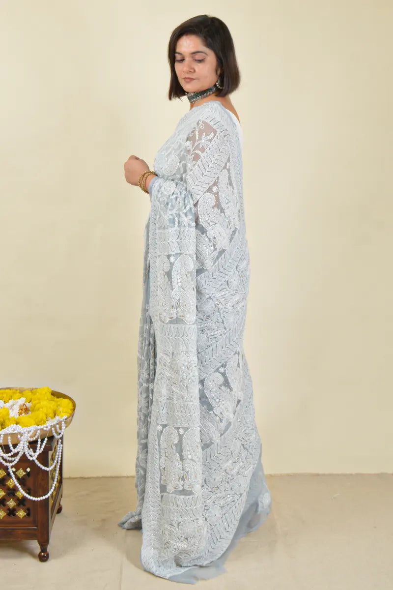 Handcrafted Gray Allover saree with intricate Lucknowi Chikankari embroidery and a matching blouse, ideal for festive and wedding occasions.