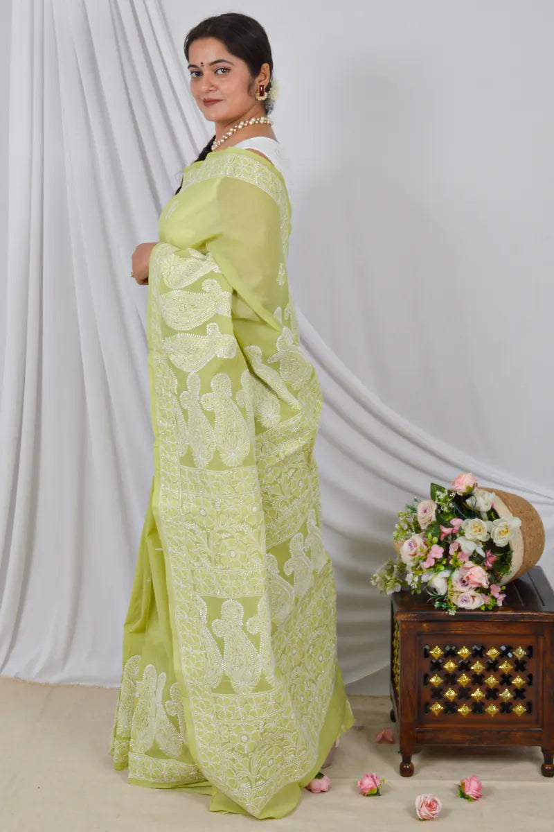 Handcrafted Green Skirt Palla Cotton Saree with intricate Lucknowi Chikankari embroidery and a matching Blouse, ideal for Festive and  occasions.
