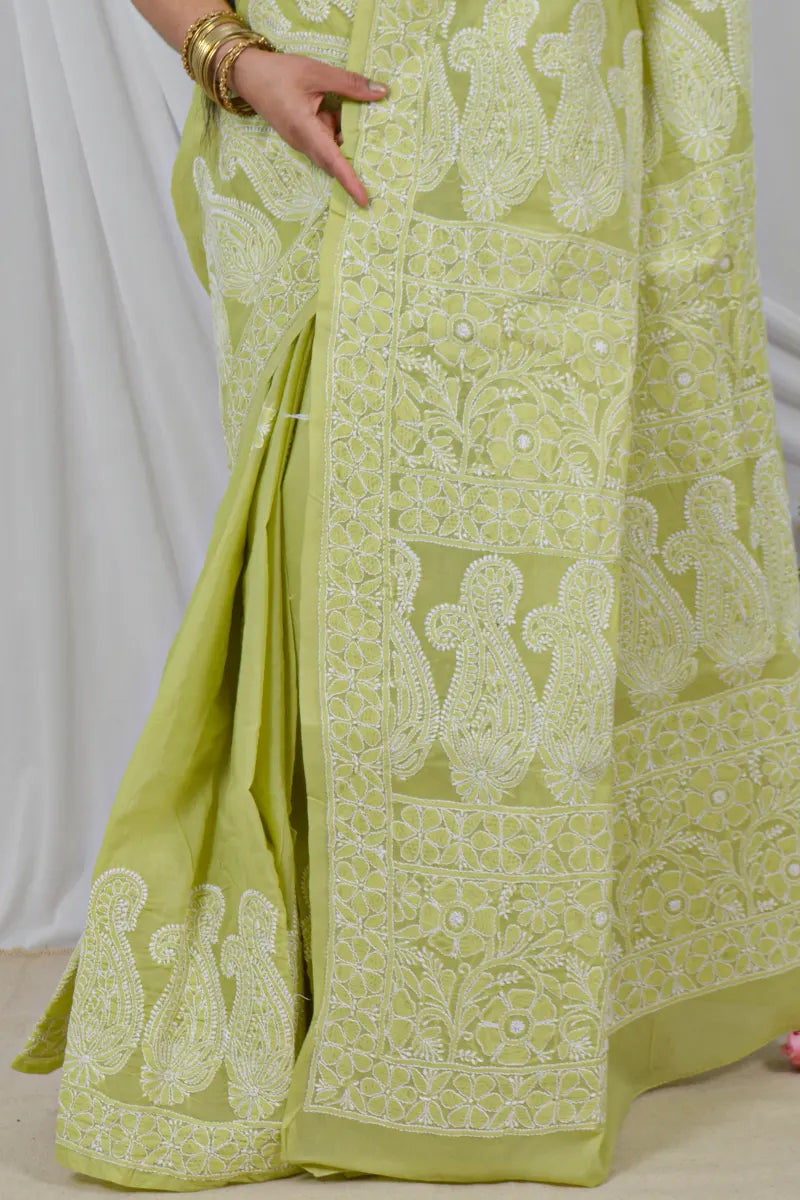 Handcrafted Green Skirt Palla Cotton Saree with intricate Lucknowi Chikankari embroidery and a matching Blouse, ideal for Festive and  occasions.