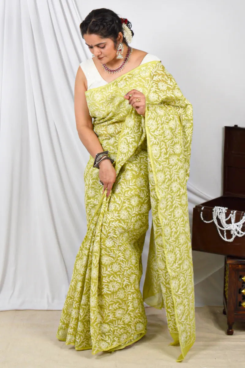 Handcrafted Green Kota Cotton Designer saree with intricate Lucknowi Chikankari Embroidery and ideal for festive and wedding occasions.