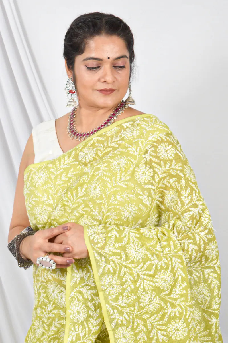 Handcrafted Green Kota Cotton Designer saree with intricate Lucknowi Chikankari Embroidery and ideal for festive and wedding occasions.